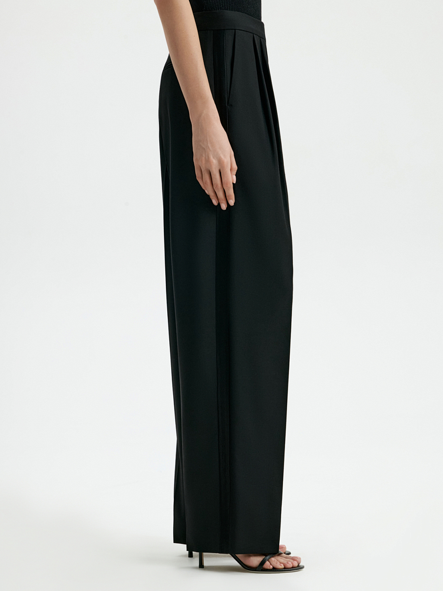 Брюки из шерсти с защипами