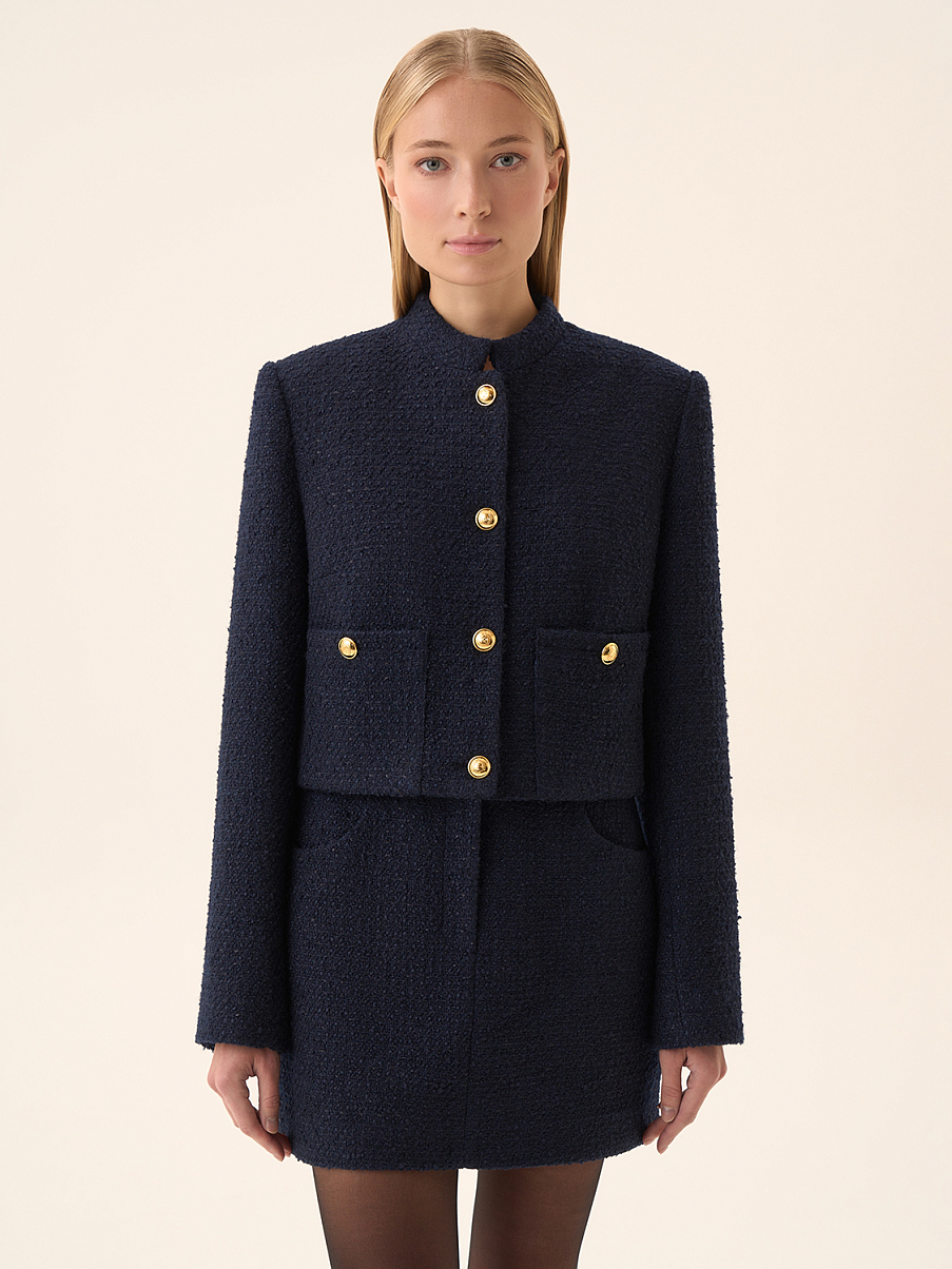 Юбка мини с декоративными карманами из ткани букле