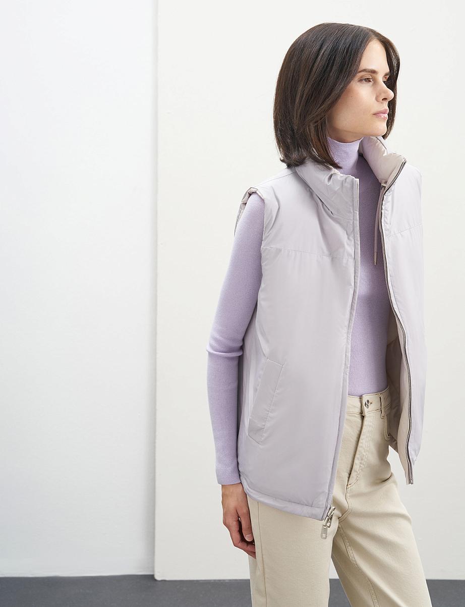 Двусторонняя жилетка с пухом и пером утки