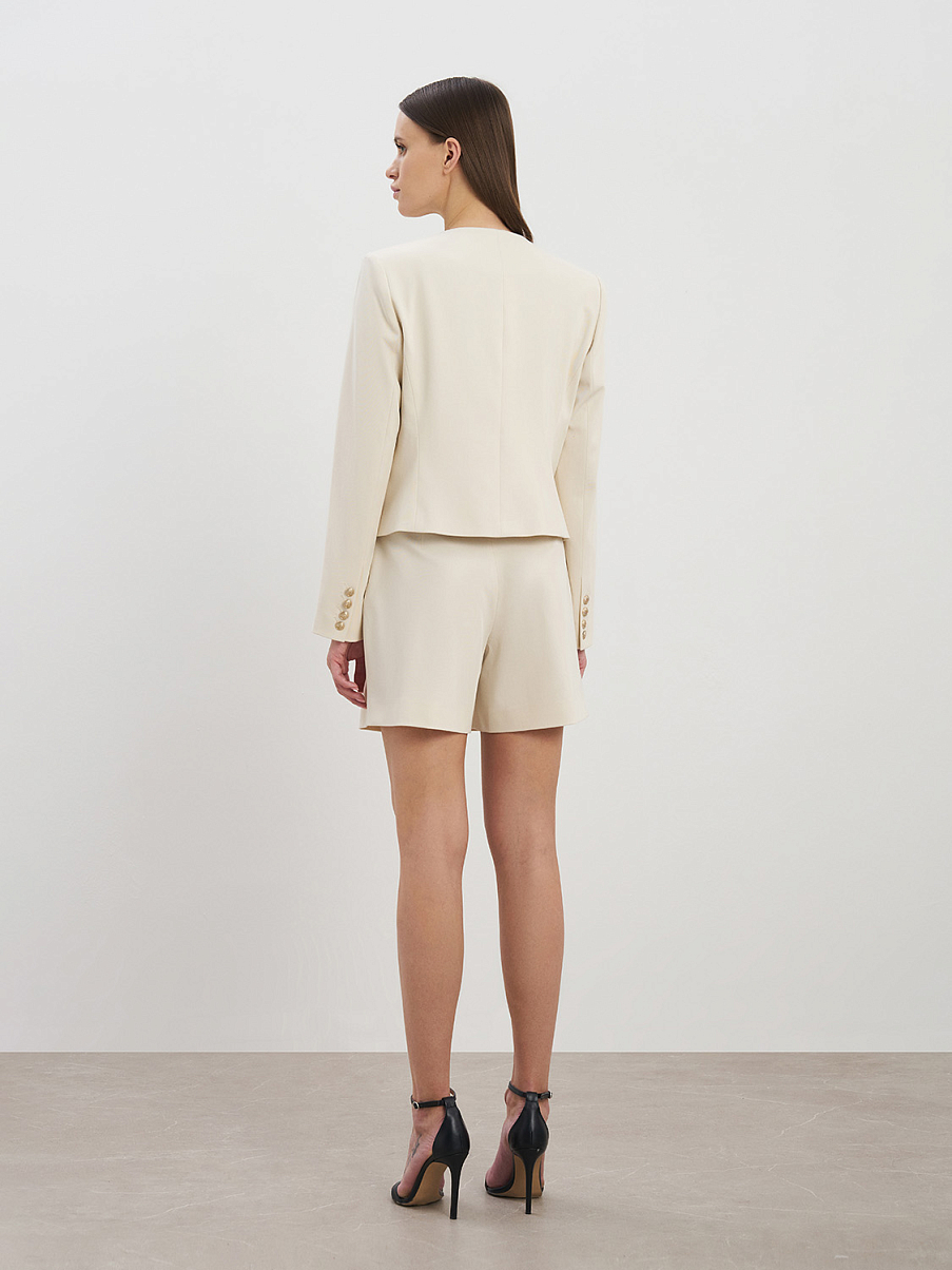 Укороченный жакет с декоративными клапанами